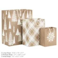 Hallmark Christmas Kraft 8-Pack Holiday Gift Bags, Assorted Sizes And Designs 8 Hallmark Christmas Kraft 8-Pack Holiday Gift Bags, Assorted Sizes And Designs -Hallmark Shop White on Kraft Paper Assortment Christmas Gift Bags 5XGB1417 03